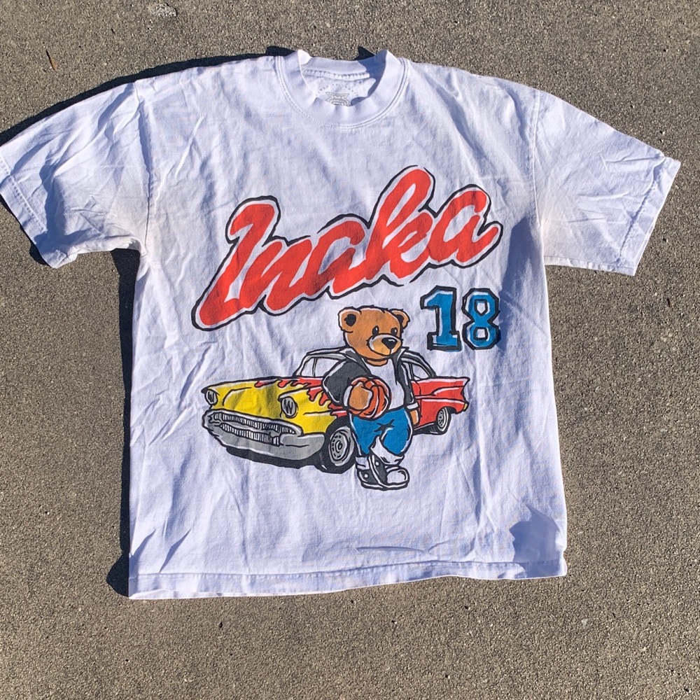 Ina White Graphic Tee with Red Script, Blue Number & Multicolor Bear Art